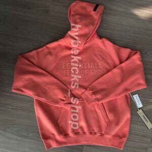 New-Fear-of-God-Essentials-Hoodie-Coral